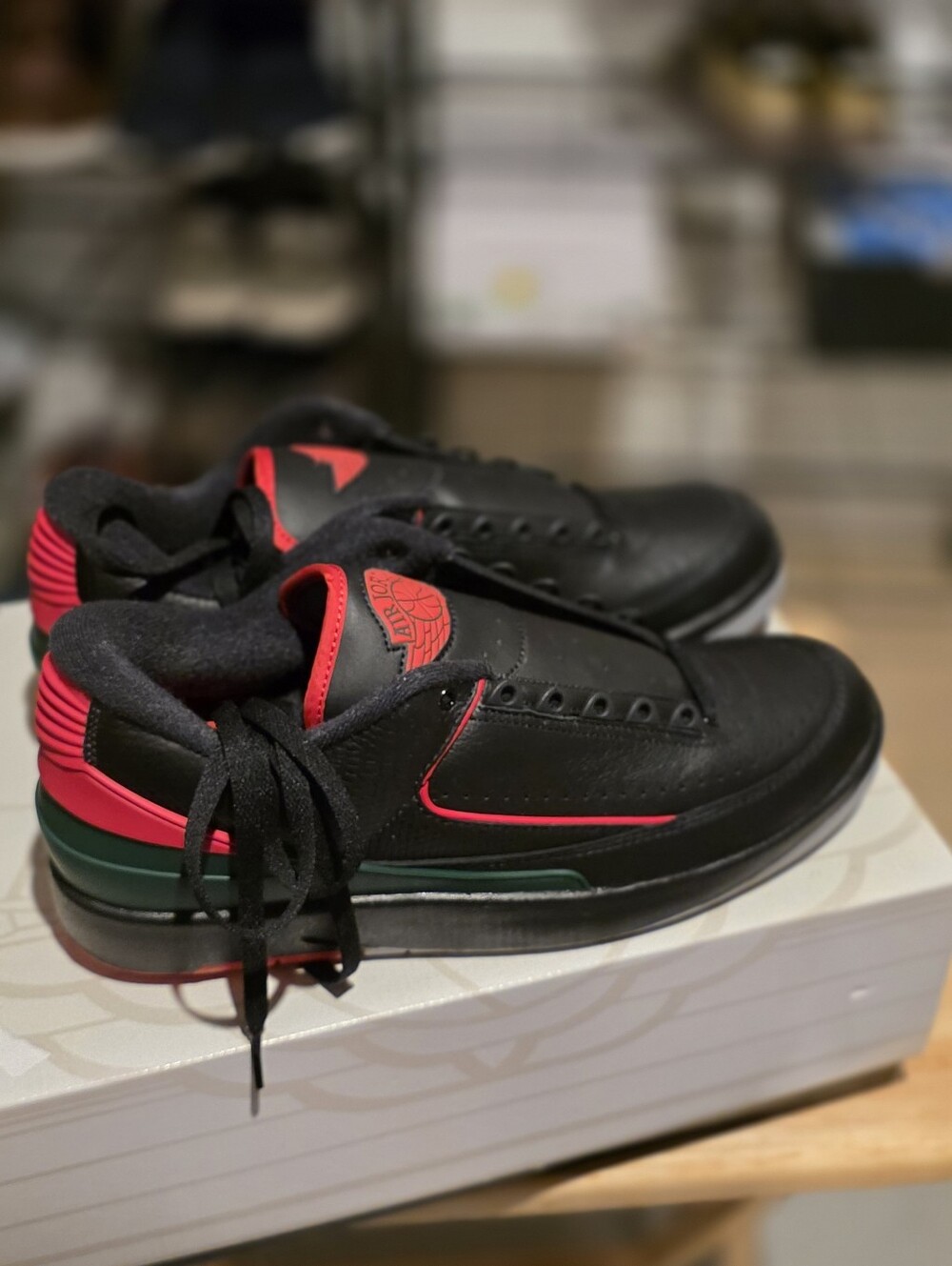 Jordan Men's Black Sneakers with Red and Green Accents